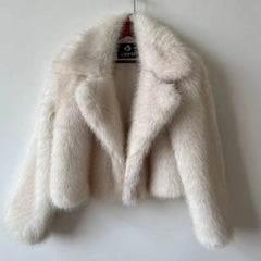 White fur coat on a white background