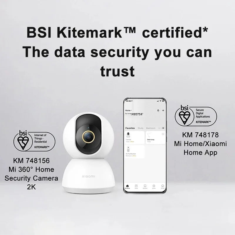 Smart home security camera and smartphone app with BSI Kitemark certification on a light gray background