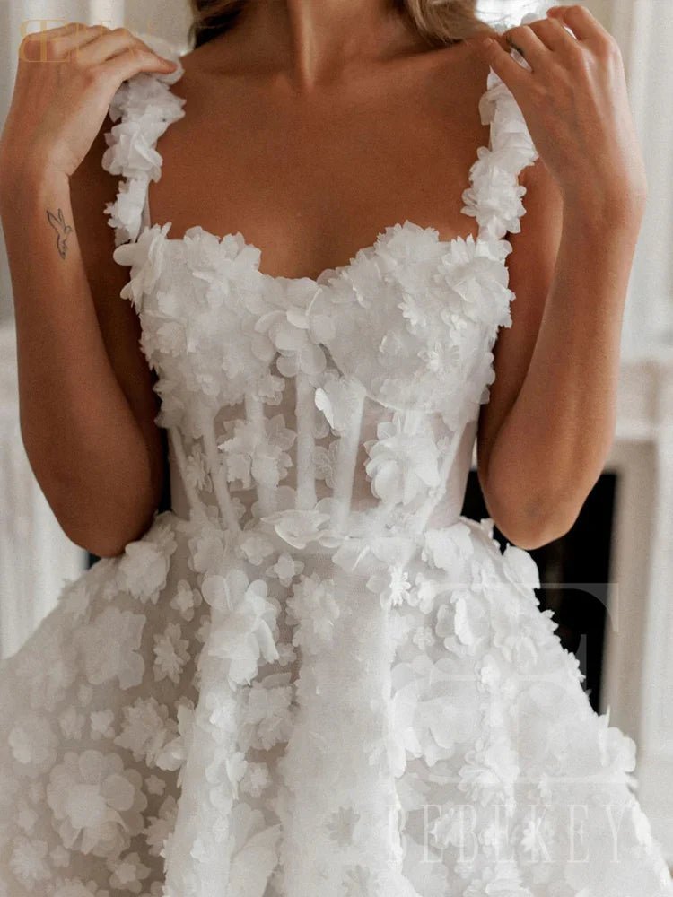 White floral wedding dress with a sheer back