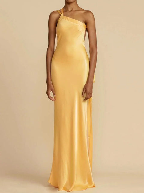 Yellow evening gown on a beige background
