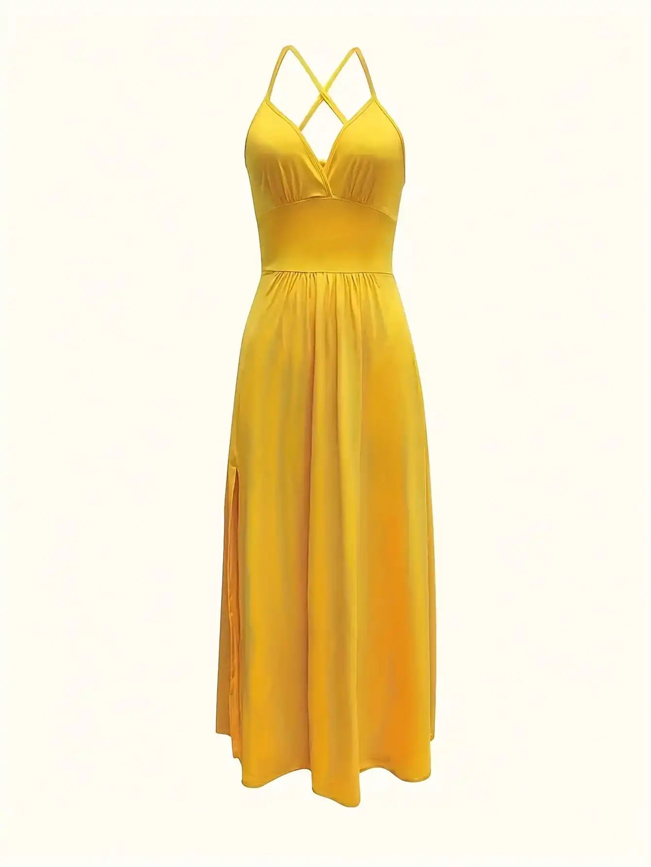 Yellow dress with criss-cross straps on a white background