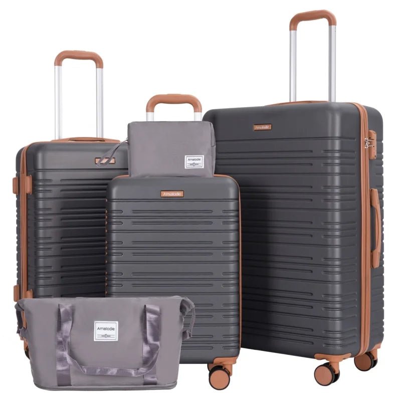 Set of gray suitcases with brown handles and wheels on a white background