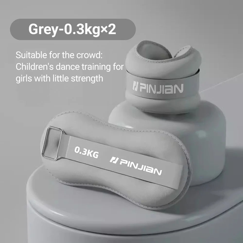 Gray wrist and ankle weights   with 'PINJIAN' branding on a gray background
