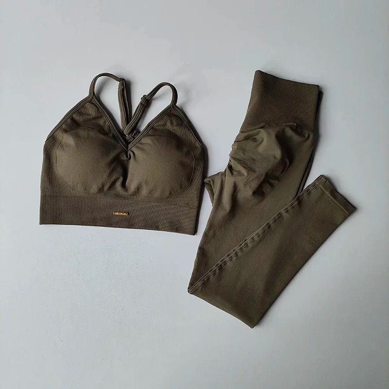 Olive green sports bra and leggings set on a light gray background