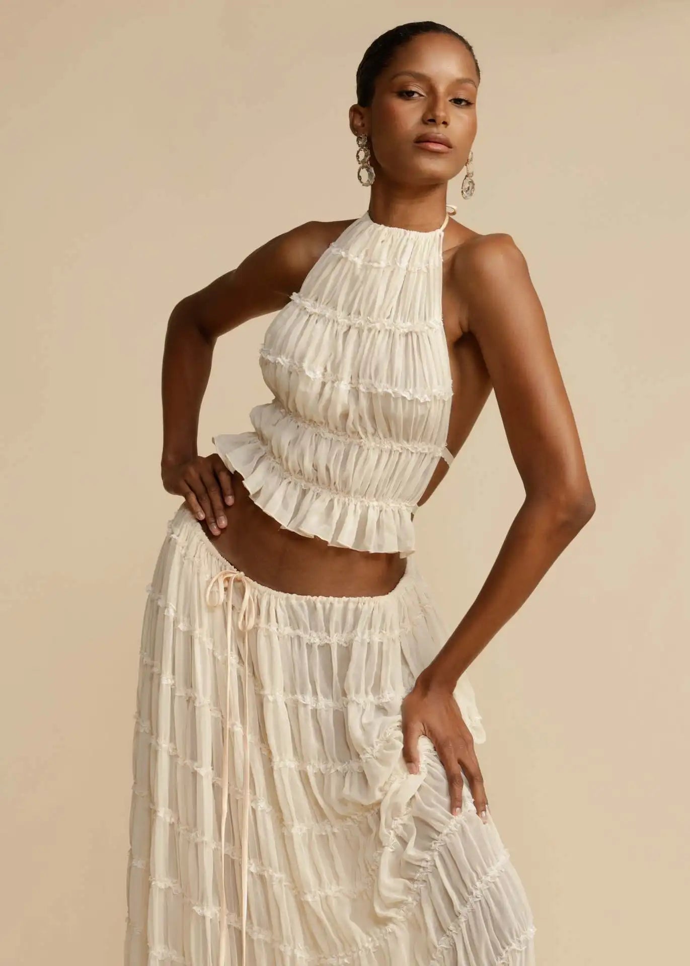 Elegant 2 Piece Set White Halter Pleated Maxi Dress with Tiered Layers and Adjustable Waist Belt & Backless Sling Top Long Skirt Suit