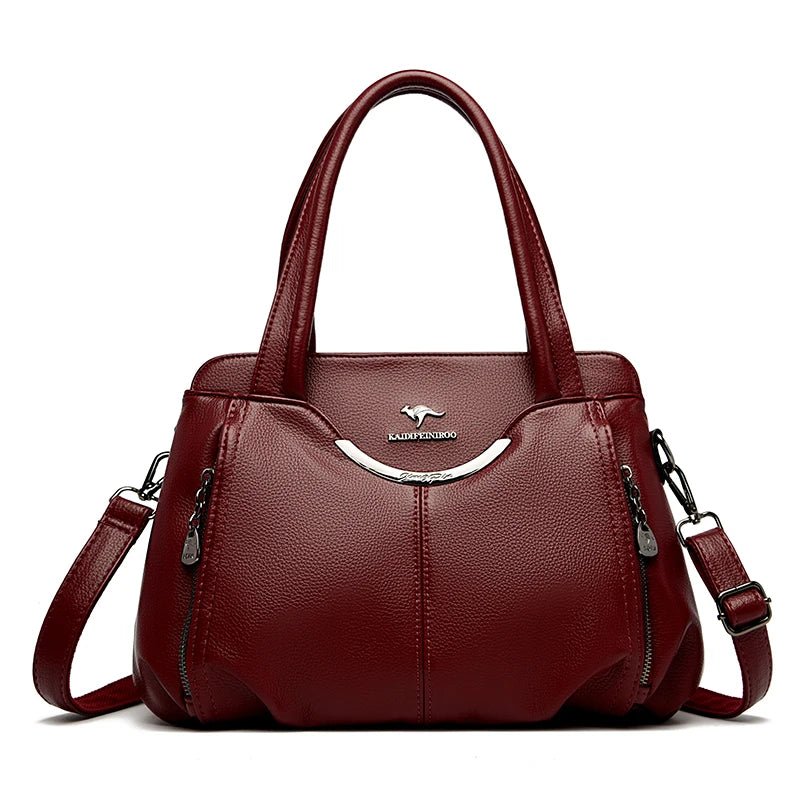 Red handbag with a visible brand logo on a white background