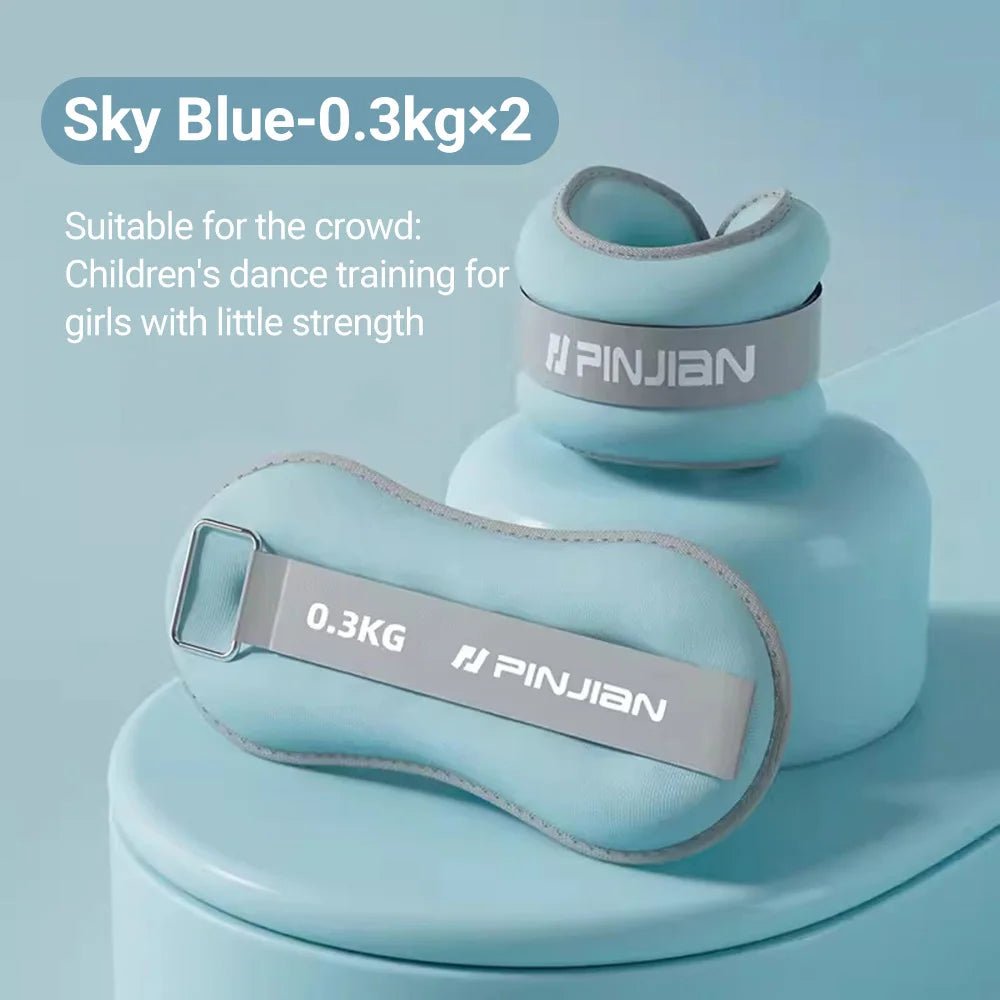 Two sky blue wrist and ankle weights  with gray straps on a light blue background, labeled 'PINJIAN'.