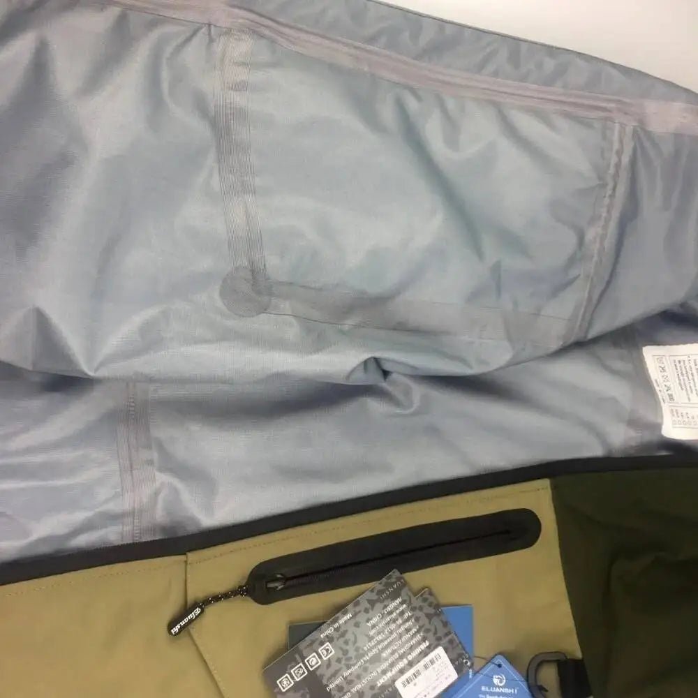 Open bag revealing items including a blue card and black strap on a beige surface.