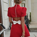 Elegant Bow-Back A-Line Cut Out Mini Dress with Pearl Button Detail