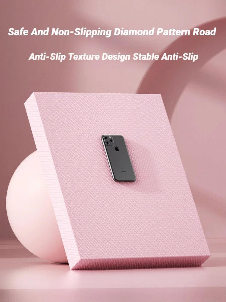 Pink anti-slip mat with a phone on it, featuring text about its design and features.