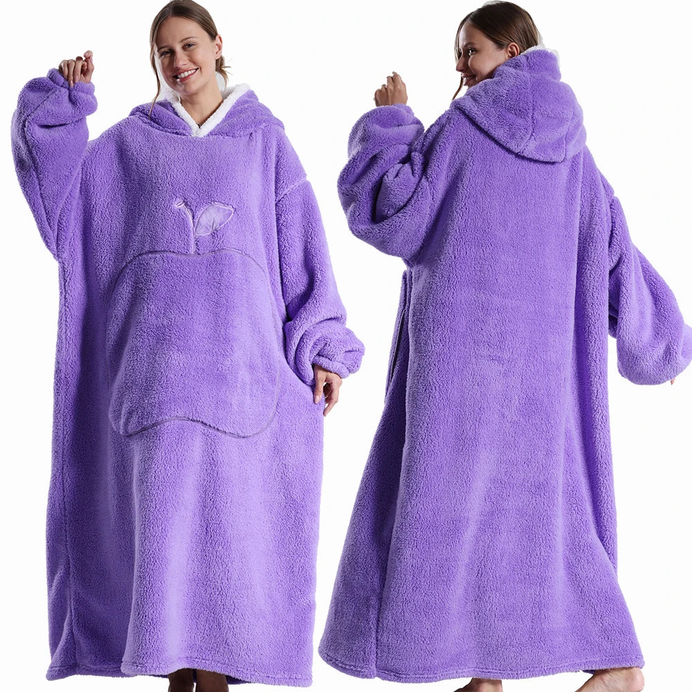 Purple fleece blanket with hood worn by a person on a white background
