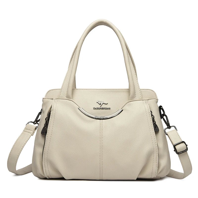 Beige handbag with a strap on a white background