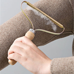 Lint Remover Fabric Shaver Brush Tool in use